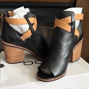 Aldo Black and Tan Heeled Boots